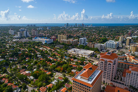 A photo of the Shalala Student Center during sunset at the University of Miami Coral Gables campus.