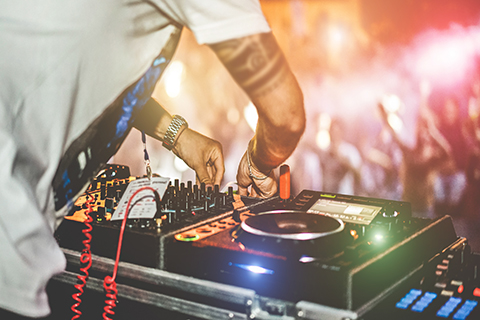 A zoomed in stock photo of a DJ's turntables.