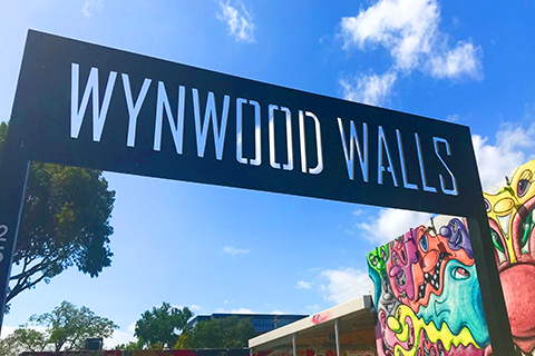A stock photo of the Wynwood Walls sign in the Wynwood neighborhood of Miami, Florida.